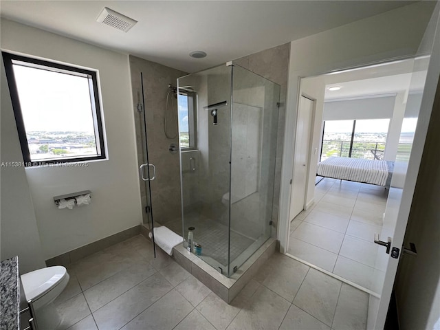 5350 NW 84th Ave Unit 1113, Doral, FL 33166 - full bath featuring a stall shower, tile patterned flooring, and ensuite bath