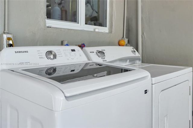 washroom with washer and clothes dryer
