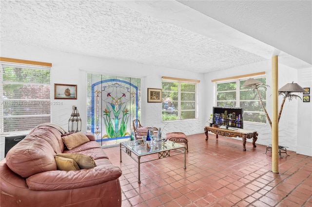 living room with a textured ceiling