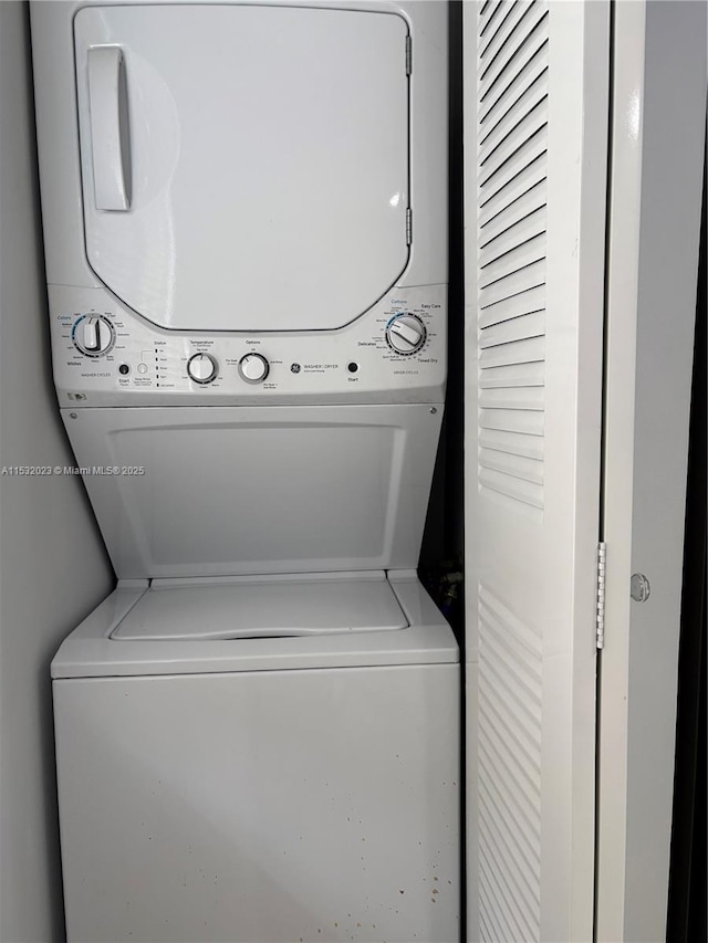12755 SW 16th Ct Unit 211B, Pembroke Pines, FL 33027 - washroom with stacked washing machine and dryer