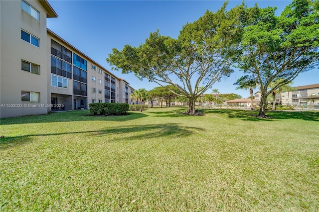 12755 SW 16th Ct Unit 211B, Pembroke Pines, FL 33027 - view of grassy yard