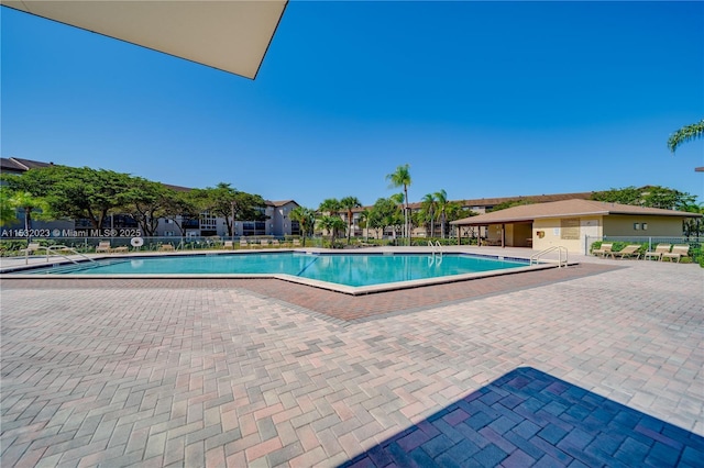 12755 SW 16th Ct Unit 211B, Pembroke Pines, FL 33027 - community pool with a patio area