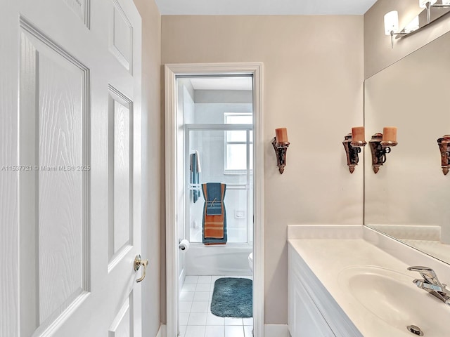 bathroom featuring toilet, vanity, and tile patterned floors