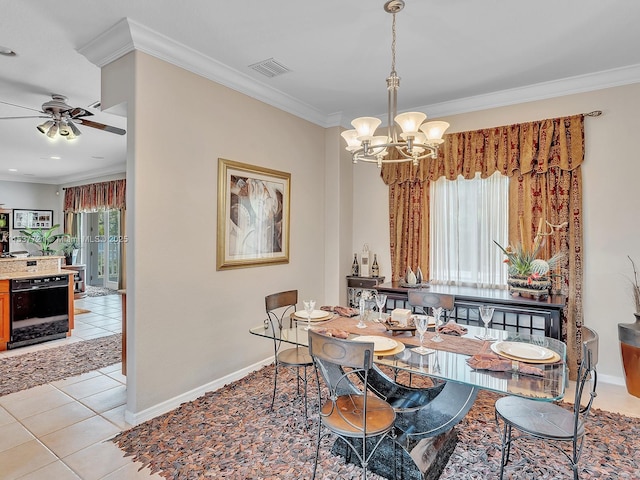 dining area with light tile patterned floors, wine cooler, visible vents, and crown molding