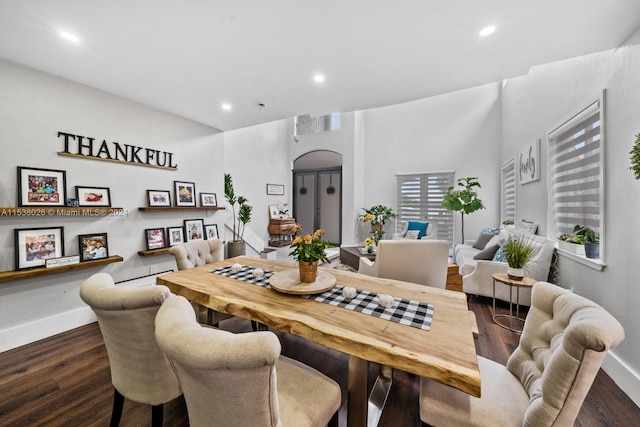 dining room with dark wood-type flooring