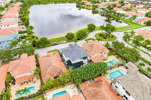 drone / aerial view with a water view