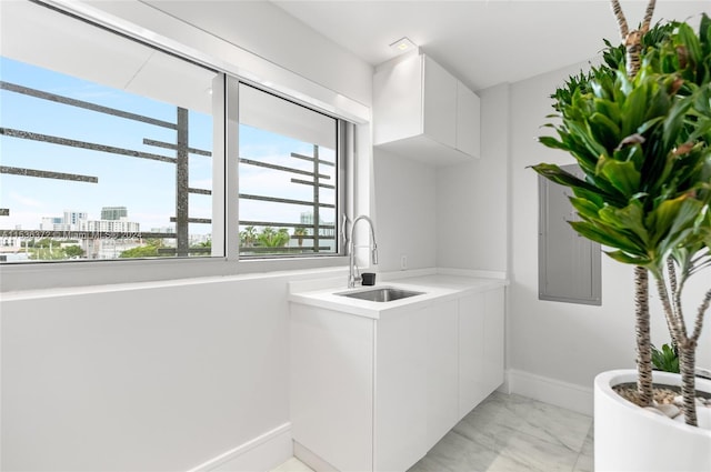 bathroom featuring sink and tile flooring