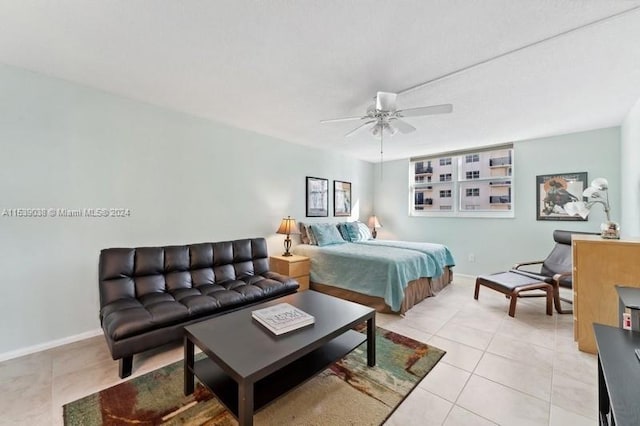 bedroom featuring ceiling fan and light tile patterned floors