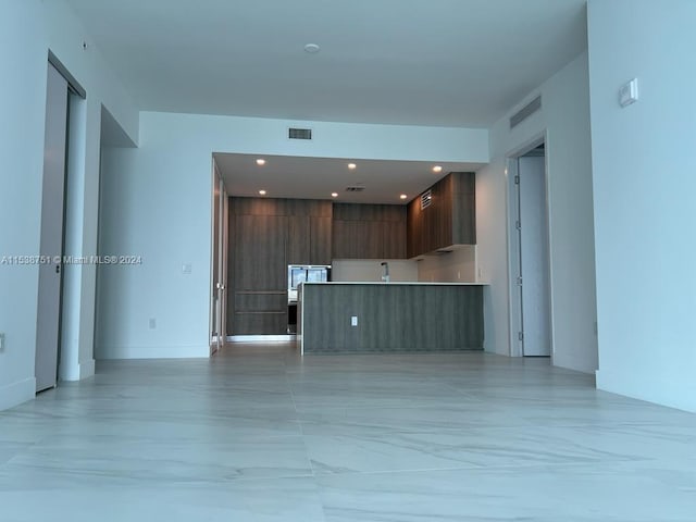 interior space featuring light tile flooring