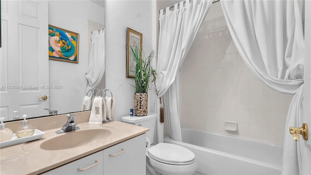 full bathroom featuring toilet, vanity, and shower / tub combo