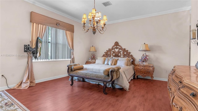 bedroom with ornamental molding, a notable chandelier, and dark hardwood / wood-style floors