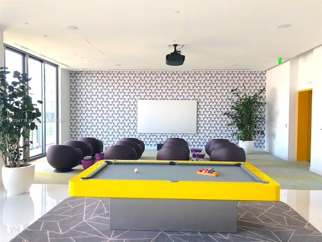 playroom with billiards and floor to ceiling windows