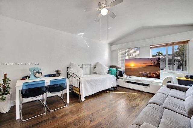 bedroom with dark hardwood / wood-style floors, lofted ceiling, and ceiling fan