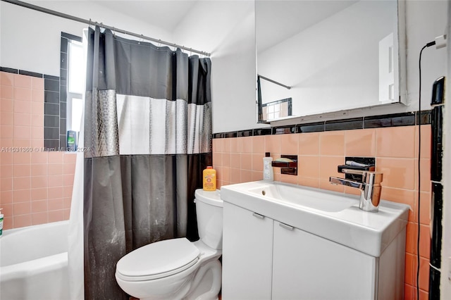 full bathroom featuring tile walls, shower / bath combination with curtain, backsplash, toilet, and vanity