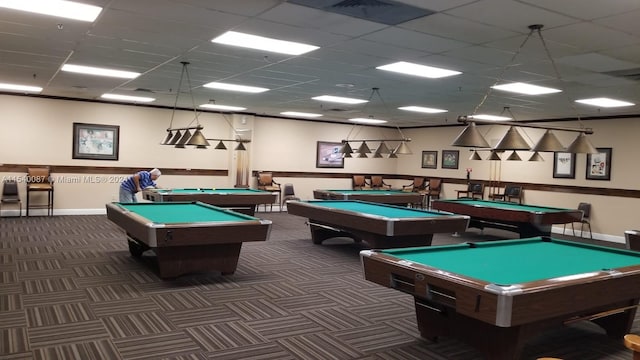 recreation room with billiards, dark colored carpet, and a drop ceiling