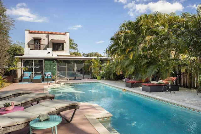 view of swimming pool with a patio