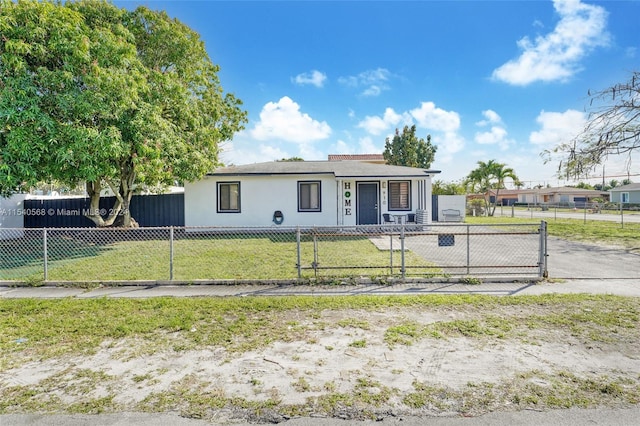 view of front facade with a front lawn