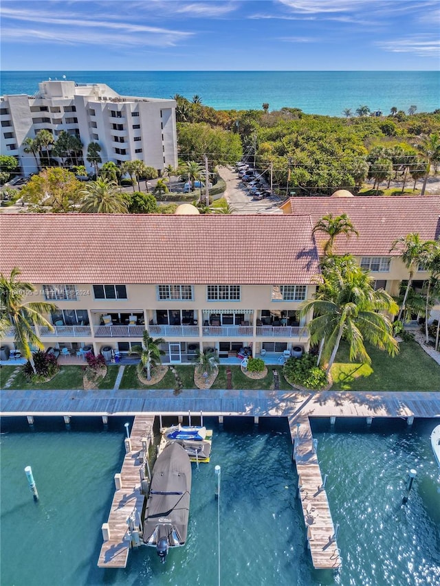 birds eye view of property featuring a water view