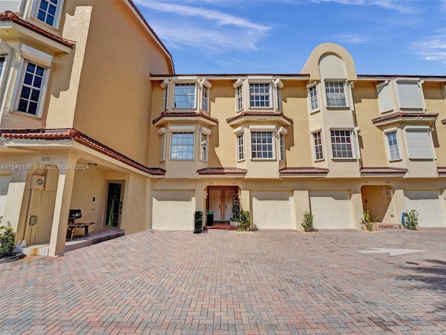 view of property featuring a garage