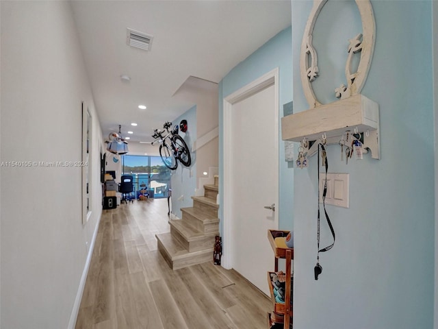 corridor featuring light hardwood / wood-style flooring