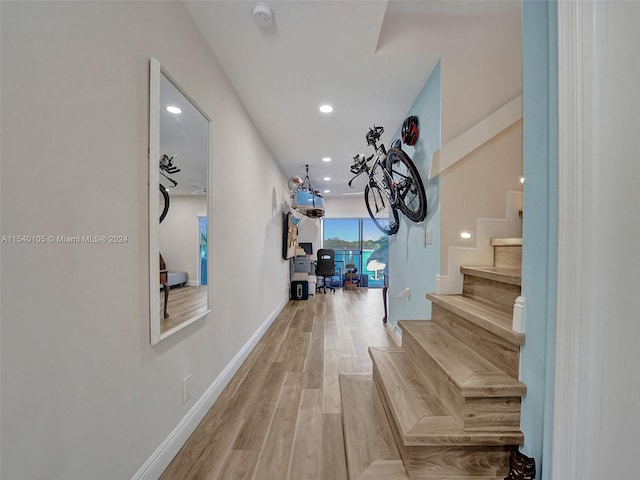 hallway with light wood-type flooring