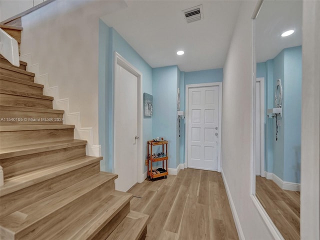 foyer entrance featuring light hardwood / wood-style flooring