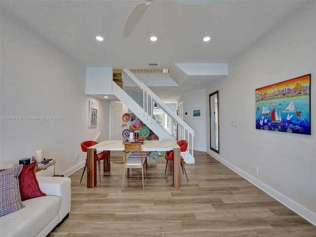 dining space featuring light wood-type flooring