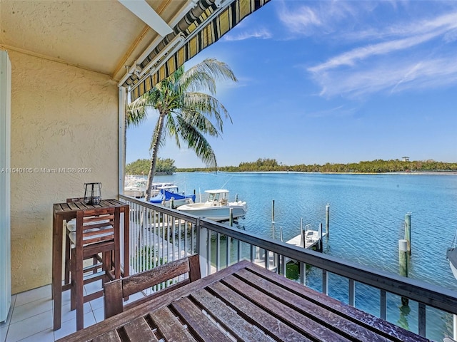 view of dock with a water view