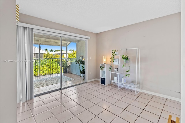 2626 SE 20th Ct Unit 206-B, Homestead, FL 33035 - spare room featuring light tile patterned floors