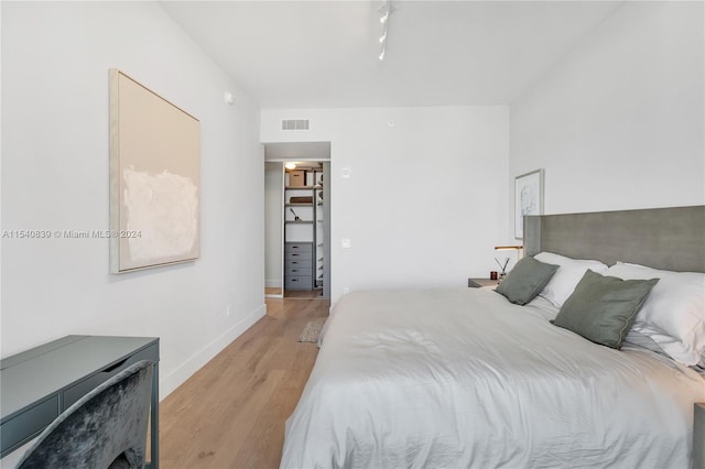 bedroom featuring light hardwood / wood-style floors