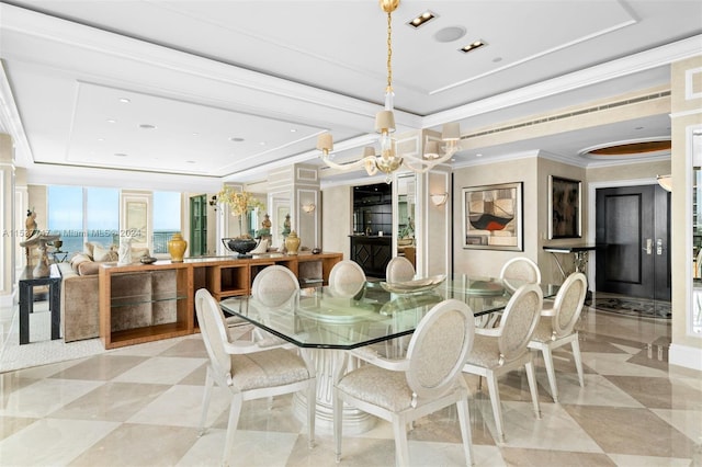 tiled dining space featuring a raised ceiling, ornamental molding, and a chandelier