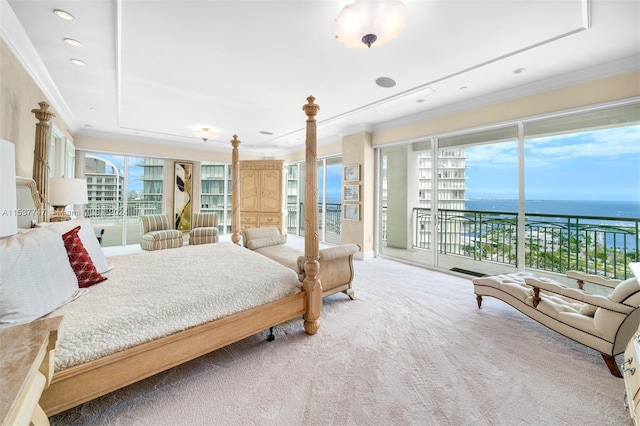 bedroom with a water view, access to exterior, light colored carpet, and crown molding