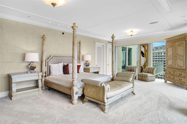 bedroom with light carpet and crown molding