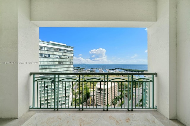 balcony featuring a water view