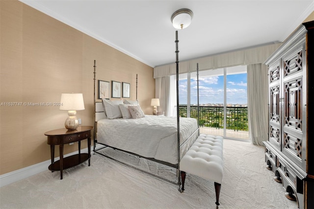 bedroom featuring light carpet, crown molding, and access to outside