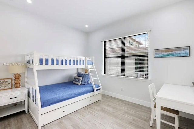 bedroom with light hardwood / wood-style floors