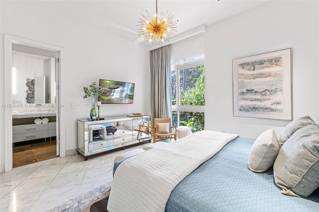 bedroom with an inviting chandelier and light tile floors