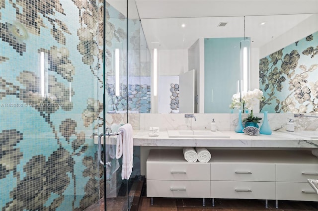 bathroom featuring large vanity