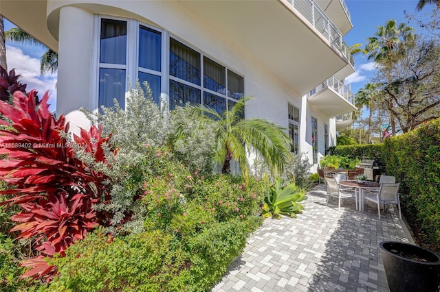 view of home's exterior with a patio