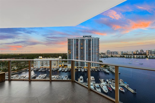 balcony at dusk with a water view