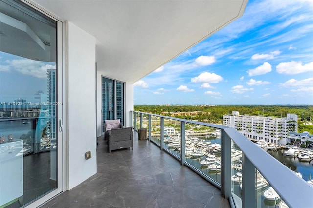 balcony featuring a water view