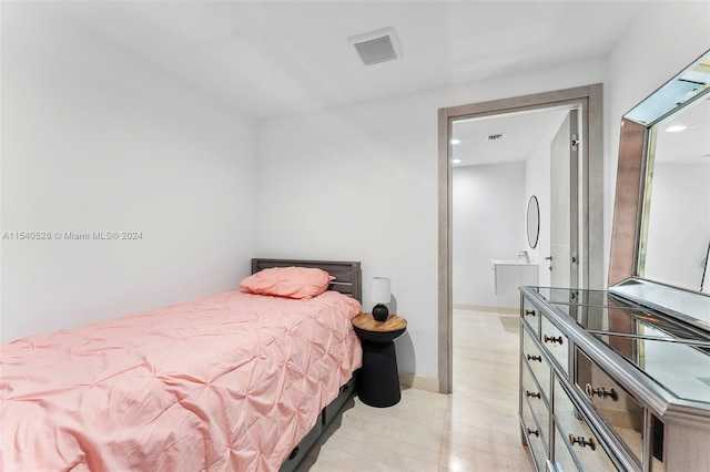 bedroom featuring light hardwood / wood-style floors