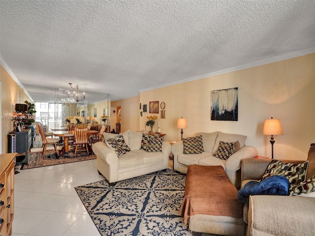 tiled living room with a textured ceiling, ornamental molding, and a chandelier