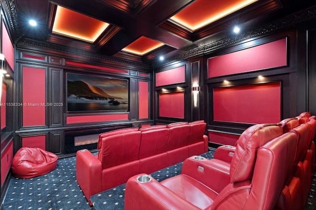 home theater featuring a decorative wall, crown molding, beamed ceiling, and coffered ceiling