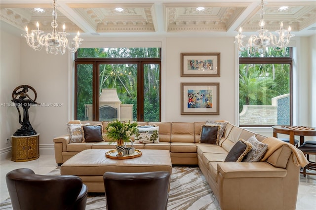 living room with a notable chandelier, beam ceiling, crown molding, and coffered ceiling