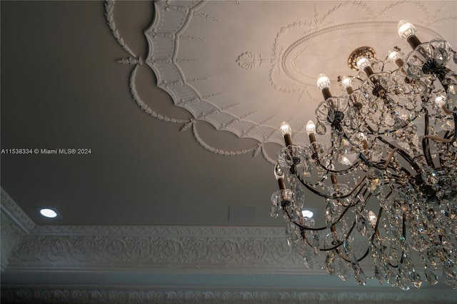 interior details with an inviting chandelier