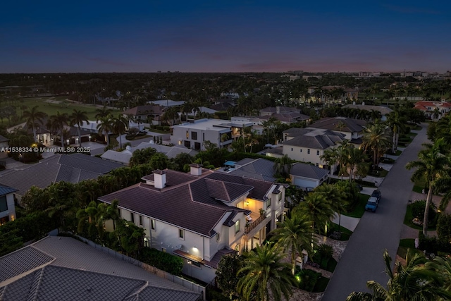 aerial view at dusk with a residential view