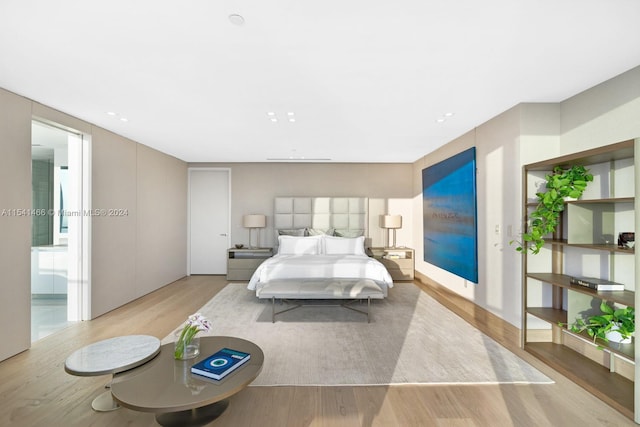 bedroom featuring light wood-type flooring