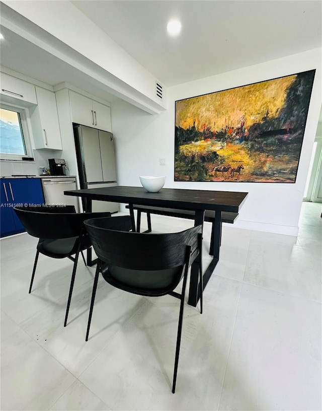 dining room with light tile flooring