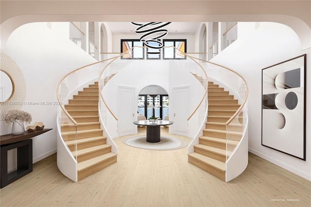 entryway featuring french doors and hardwood / wood-style flooring